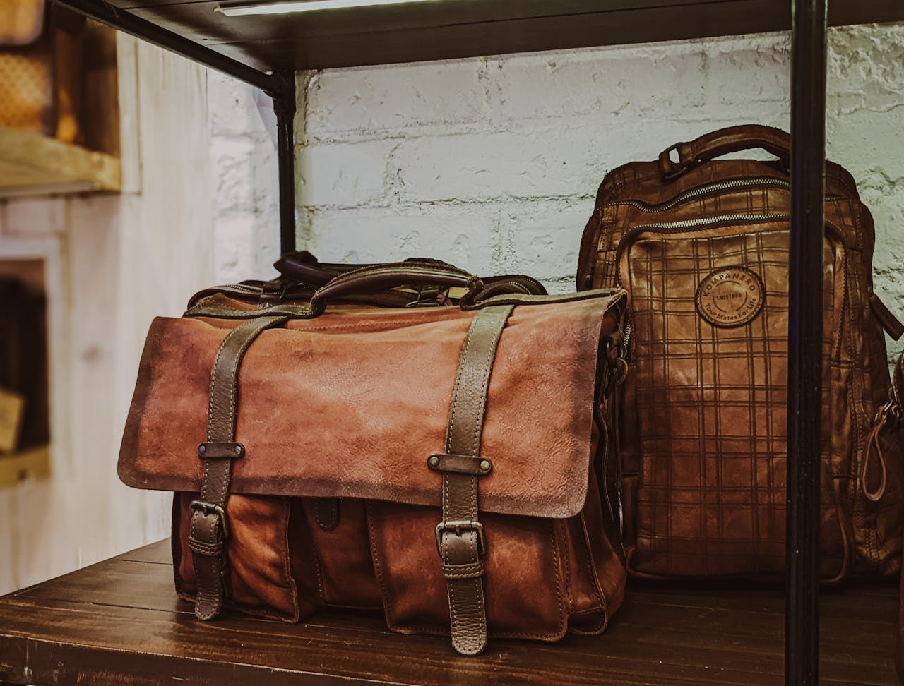 A selection of vintage leather bags on display in a Bengaluru store, showcasing craftsmanship and style.
